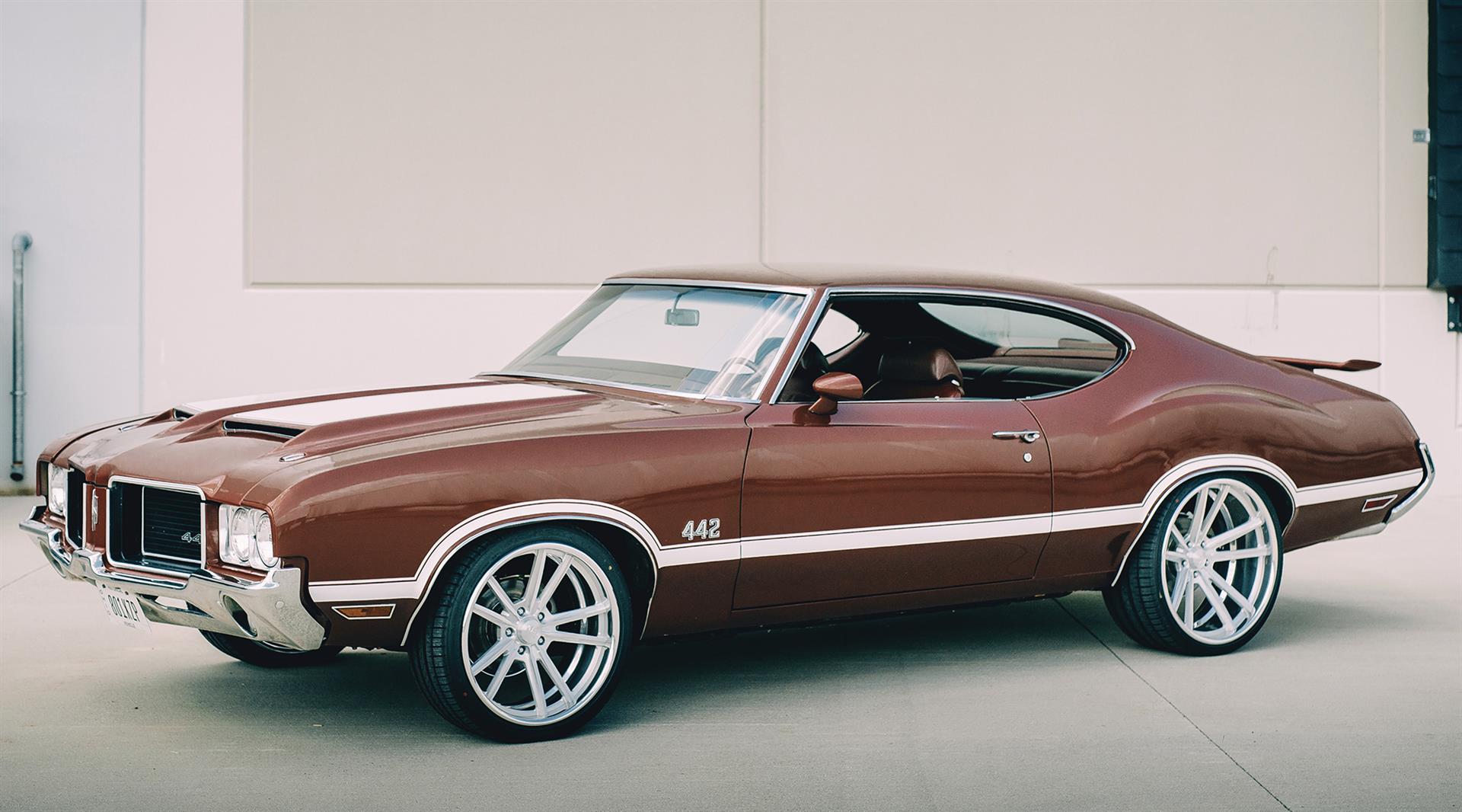 Classic muscle car with custom wheels