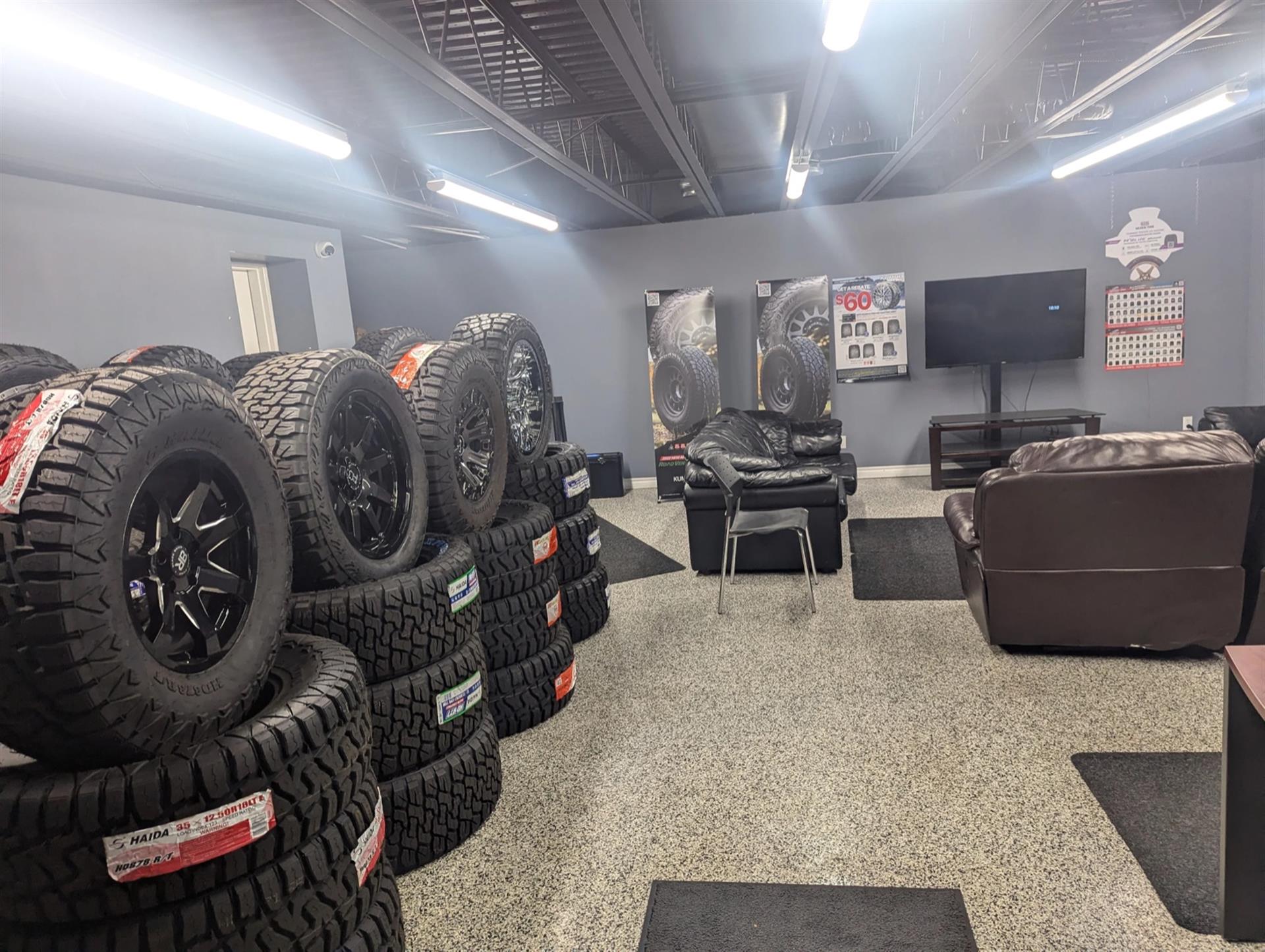 Affordable Rims and Tires showroom with tire and wheel displays.