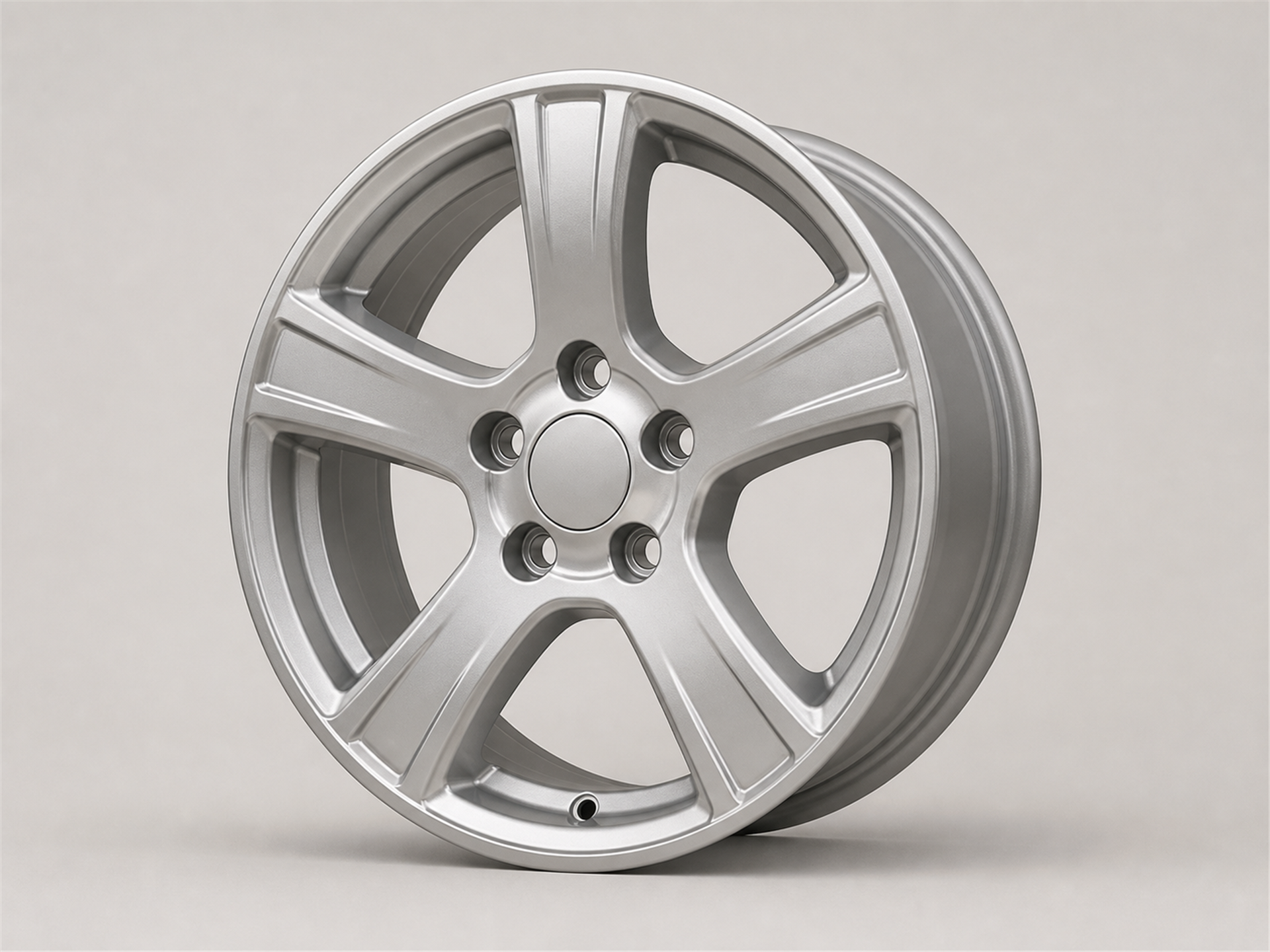 Unbranded satin silver cast aluminum automotive wheel with sturdy thick spokes shown as a standalone studio product image on a light gray background.